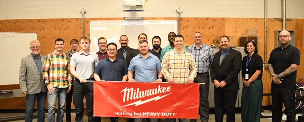 Salt Lake City Local 354’s VEEP graduation cohort from earlier this year. Greg McMurphy from the Electrical Training Alliance is to the far left, Utah Electrical Training Alliance Director Mike Lanoue is in a dark shirt and tie, JATC Instructor Nick Bryant is fourth from the right, and Local 354 organizer and Eight District Veterans Committee representative Tony Sorro is to the far right.