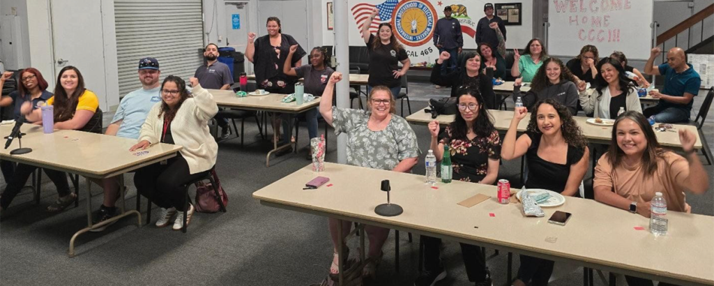 San Diego Local 465's Cece Marquez (center, standing) recently met with some of the 200 newly organized workers from San Diego Gas and Electric's call center. Marquez led the organizing campaign.